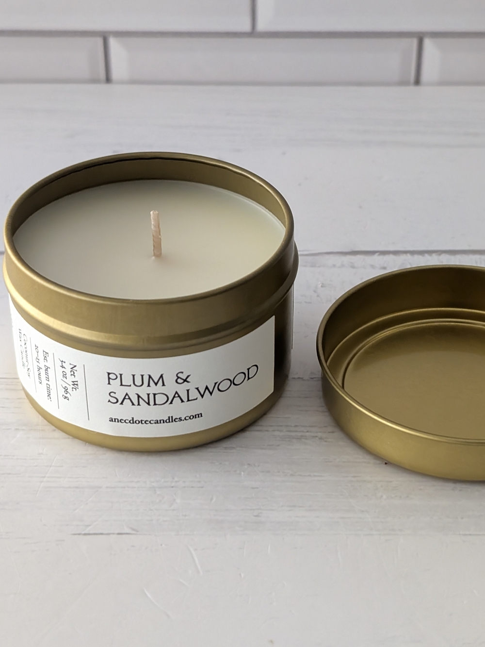 Anecdote Plum & Sandalwood Travel Tin Candle - Gold